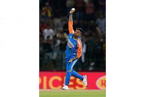 Suryakumar Yadav bowls a delivery against Sri Lanka